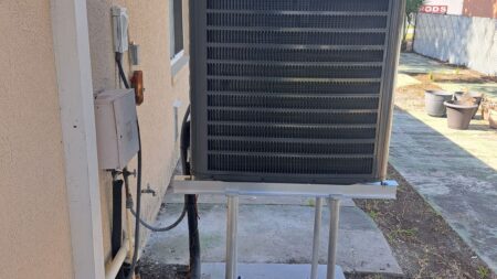 Newly installed insulated HVAC supply plenum connected to a residential air handler for efficient air distribution
