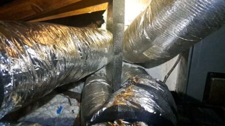 Insulated flexible air ducts professionally installed in the attic for balanced home airflow