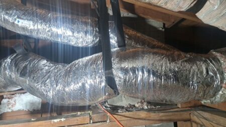 Insulated flexible HVAC ductwork installed in the attic for efficient air distribution