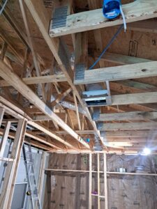 New insulated HVAC ductwork installed during residential home construction for efficient air distribution