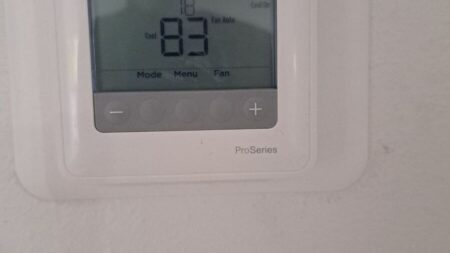 Honeywell Home ProSeries thermostat installed for precise residential HVAC temperature control